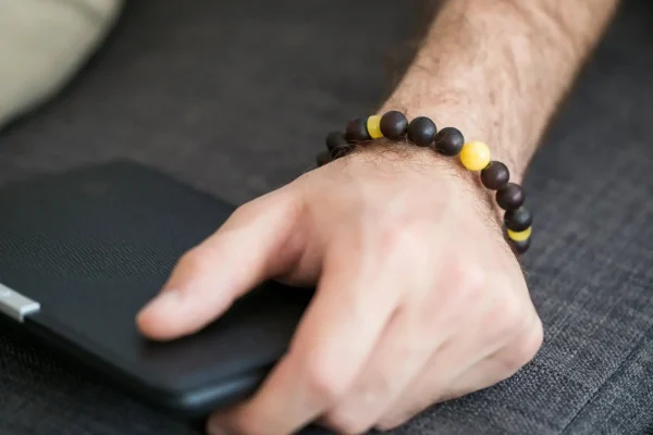 Dark Amber Bead Bracelet with Polished Yellow Accents - Image 2